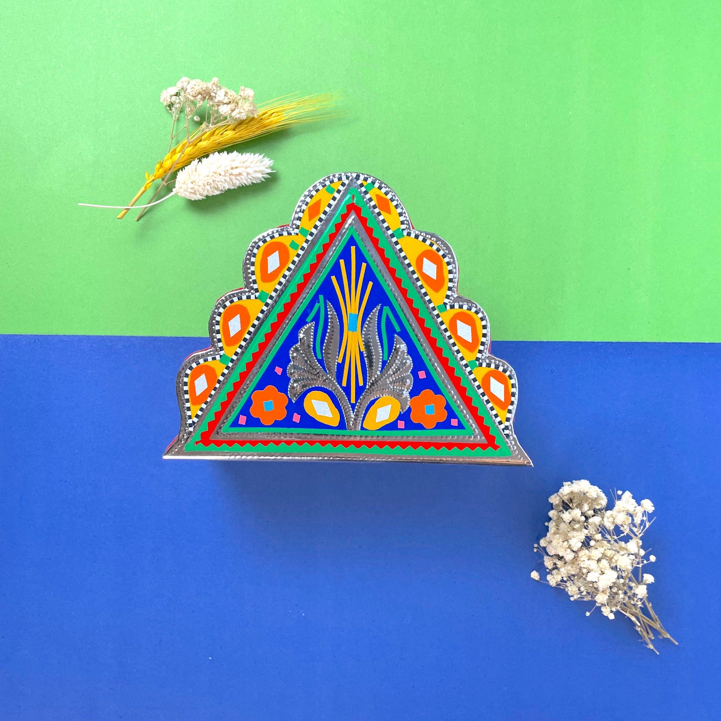 Blue and yellow triangular napkin holder